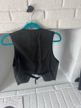 Melanoma black leather vest